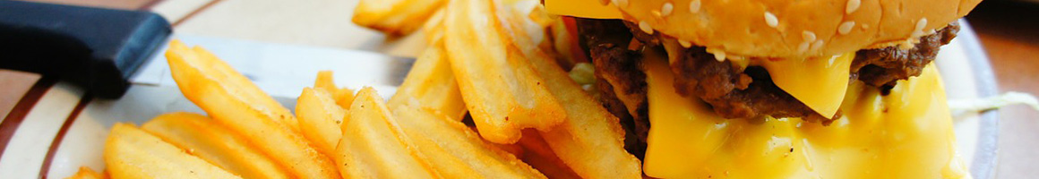 Eating Burger at Burger Express restaurant in Libby, MT.